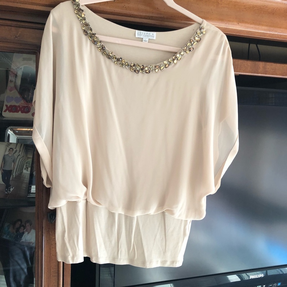 Color cream, size L , good condition